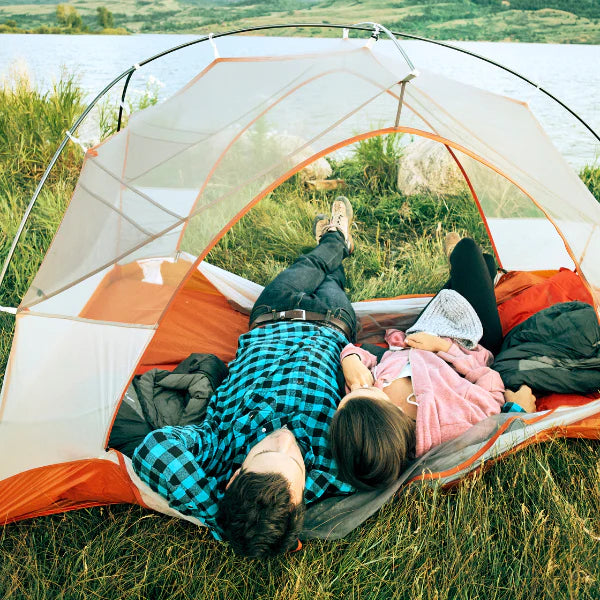 Couple In Camping Tent